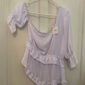 Never worn top, one shoulder sleeve